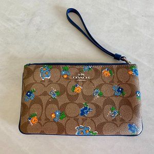 Coach brown flowered wristlet